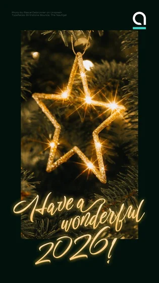 A photo of a glowing star shaped decoration on a tree, with text below reads:
Have a wonderful 2026!